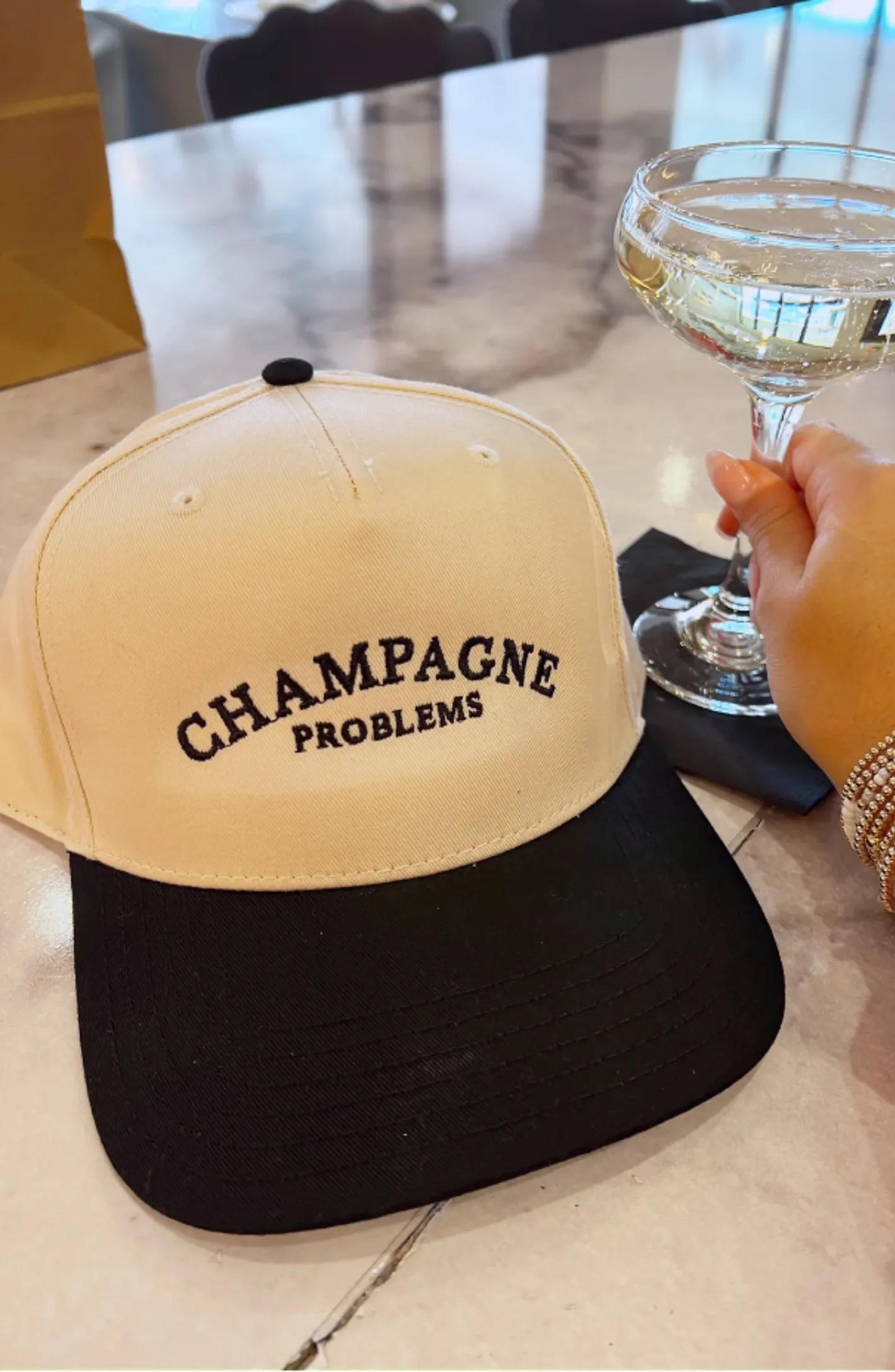 Champagne Problems Trucker Hat